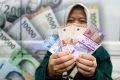 Bansos PKH dan Sembako Cair Bulan Ini, Sasar 18 Juta Keluarga